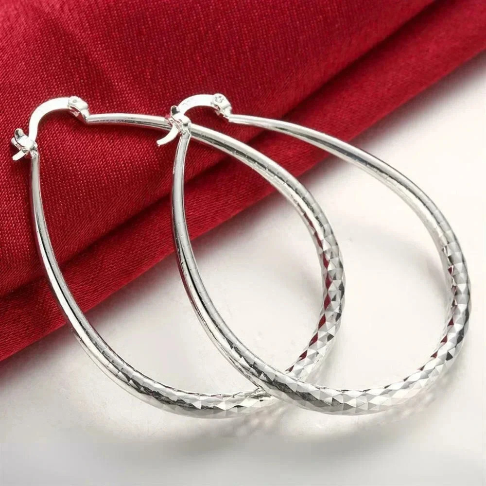 925 Sterling Silver Diamond Cut Oval Hoop Earrings